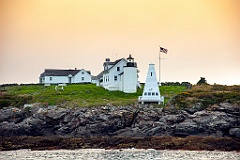 Sun Breaking Through Clouds at Tenants Harbor Light